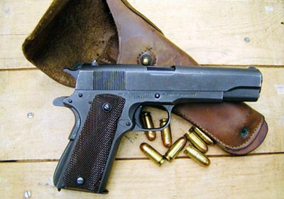 Пистолет Кольт М 1911А1 с патронами .45 АСР