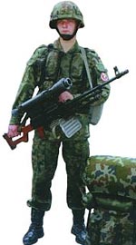 Польский спецназовец с единым пулеметом Калашникова ПКМН с ночным прицелом НСПУ