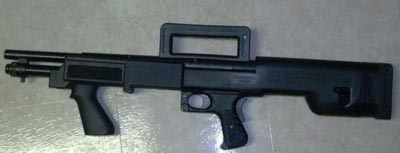 Помповое ружье Mossberg М500 в фирменной пластиковой ложе компоновки буллпап
