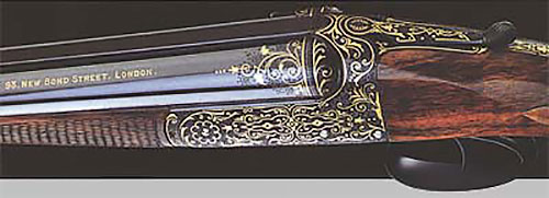 Двуствольный экспресс калибра .360 (№ 8376) с коробчатыми замками, стальными стволами, верхним ключом отпирания и орнаментальной инкрустацией золотом. Ружьё сделано в 1885 году.