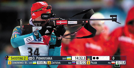 Елена Пидгрушная, олимпийская чемпионка 2014 года в эстафете, и ее биатлонная винтовка калибра .22 LR